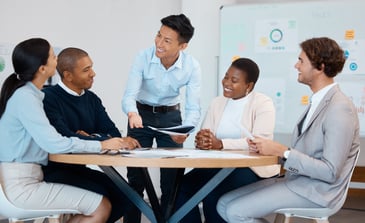 Manager analysing AI dashboard demonstrating modern leadership in technology-driven workplace. 