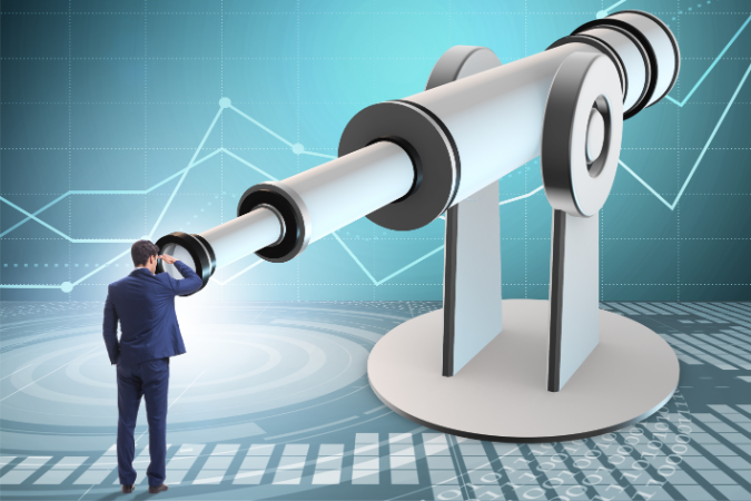 Businessman looking into the future through a huge telescope, surrounded by analytical graphics, whilst considering goals him and his team strive to meet. 