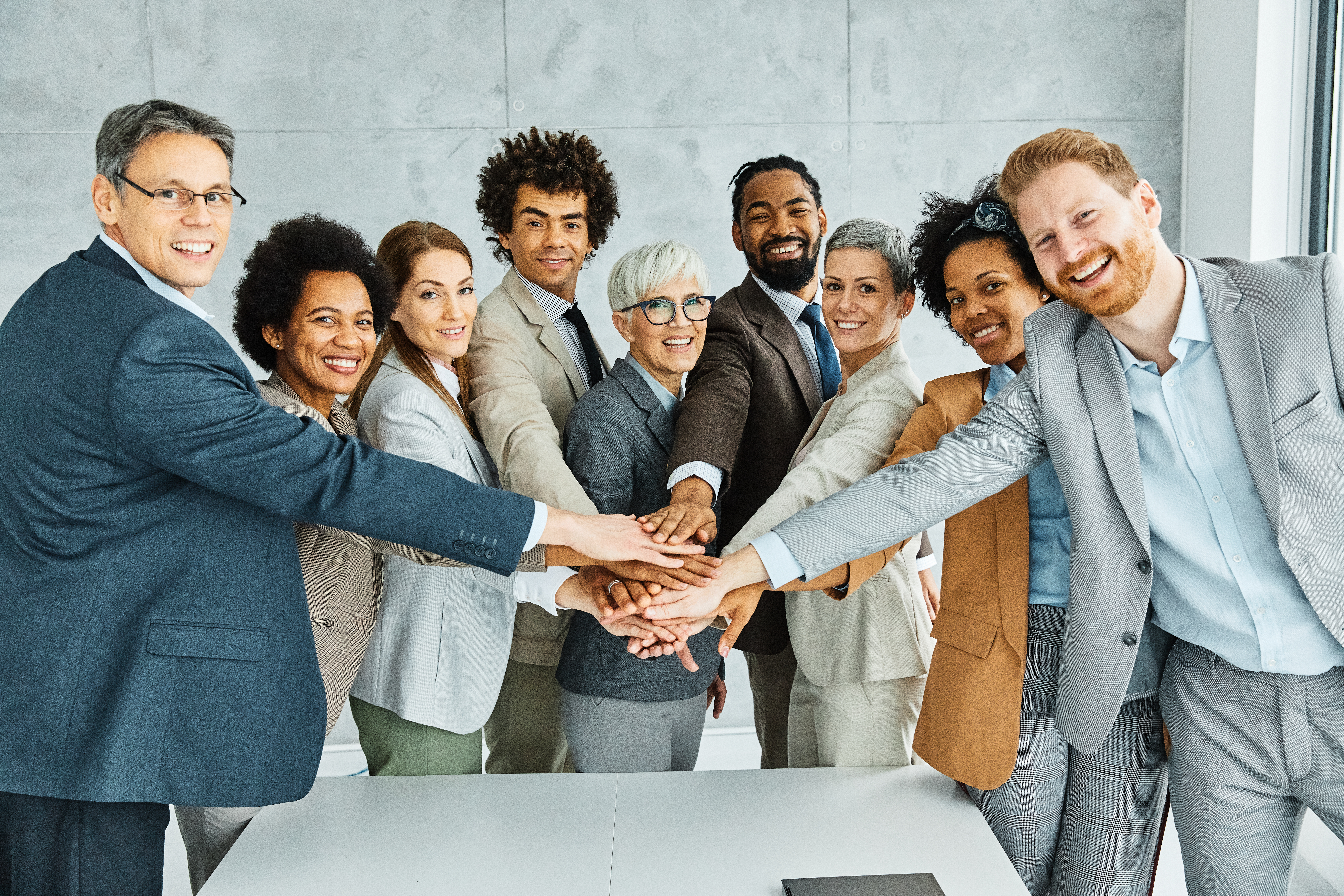 Business leaders collaborating in a strategy meeting focused on building resilient teams in a changing workplace.